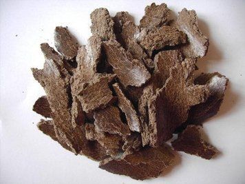 Прессованный подсолнечный жмых (макуха) Мистер Хеликс 100г для улиток ахатин, архахатин, лимиколярий 121218 фото
